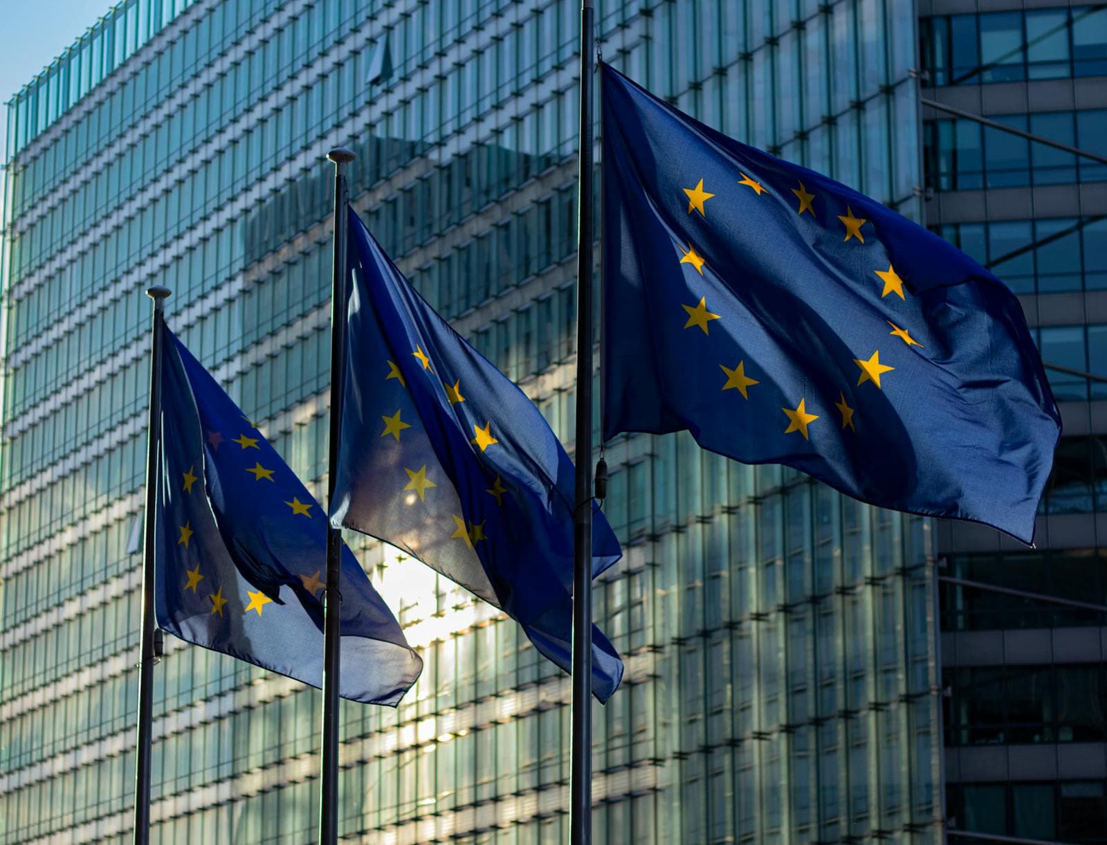 European Union flags outside the European Commission Berlaymont in Brussels.