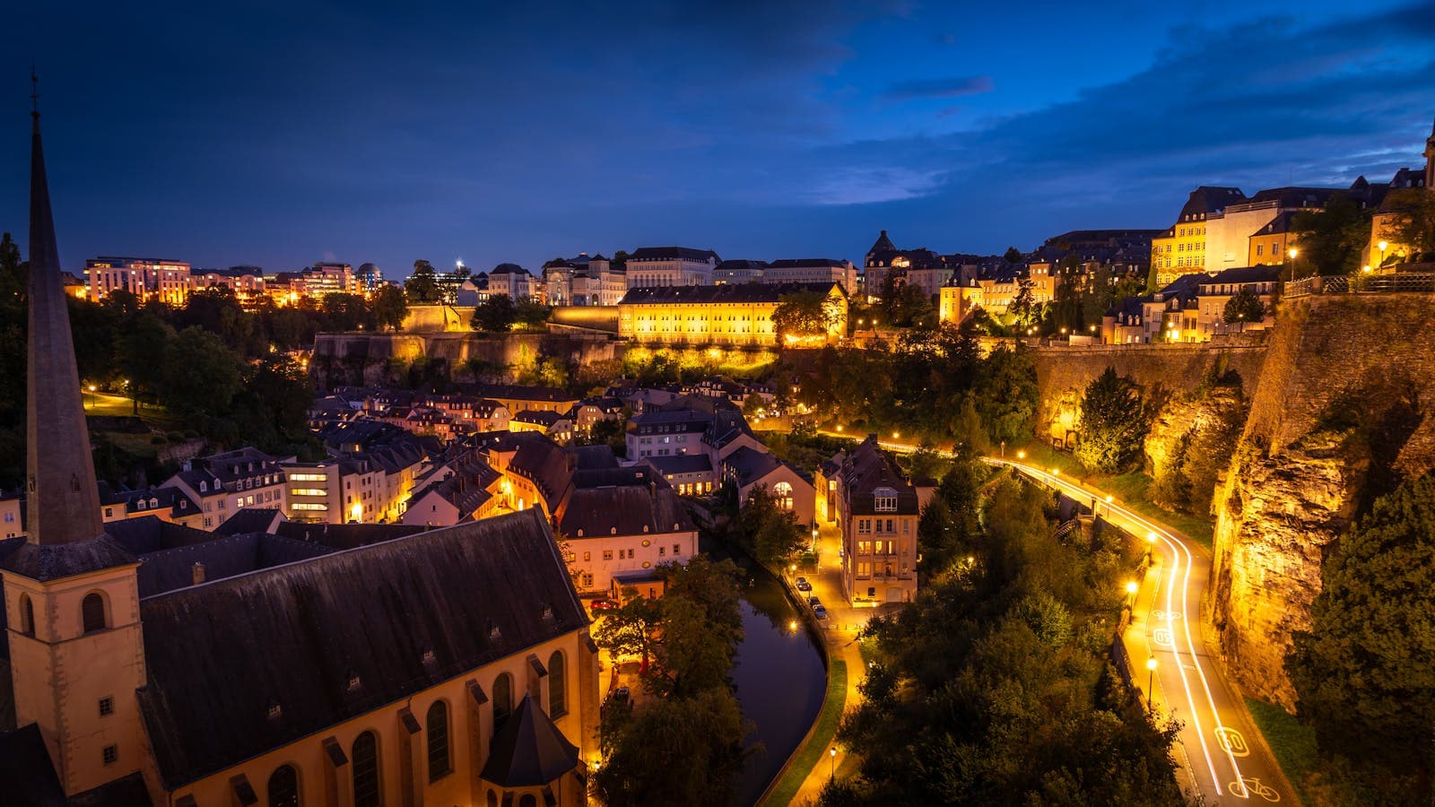 Luxembourg City captured in a blue-hour cityscape.